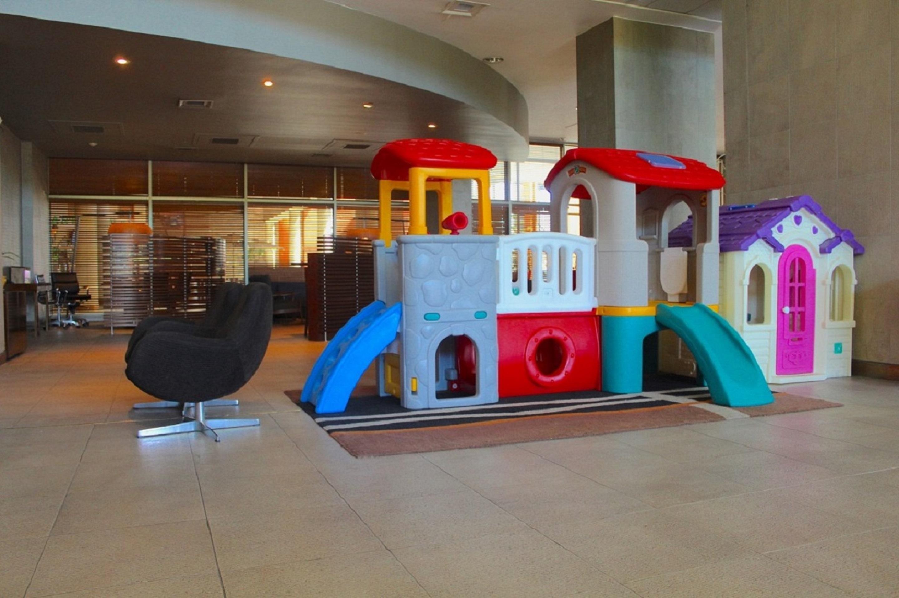 Sonesta Hotel Osorno Exterior photo A children's play area at a hotel