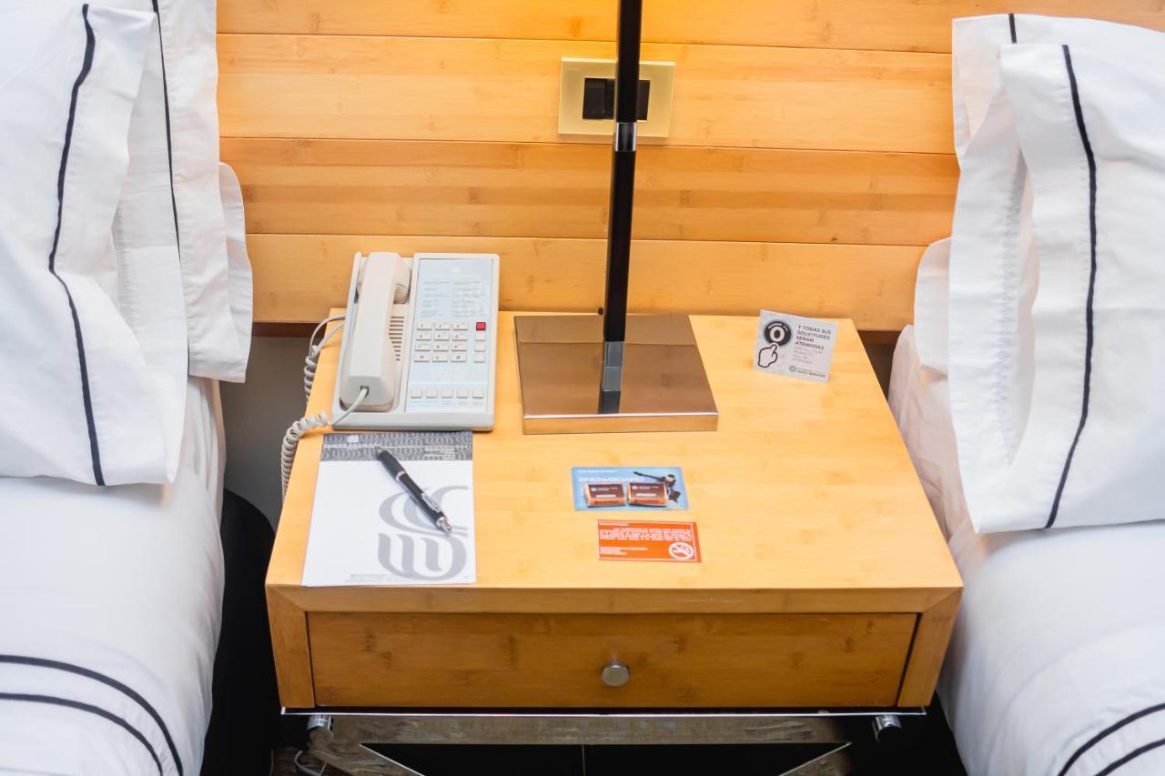 Sonesta Hotel Osorno Exterior photo A bedside table